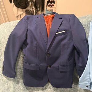 Stylish Kids' Navy Suit with Pocket Detail, button down shirt, ties, and shoes
